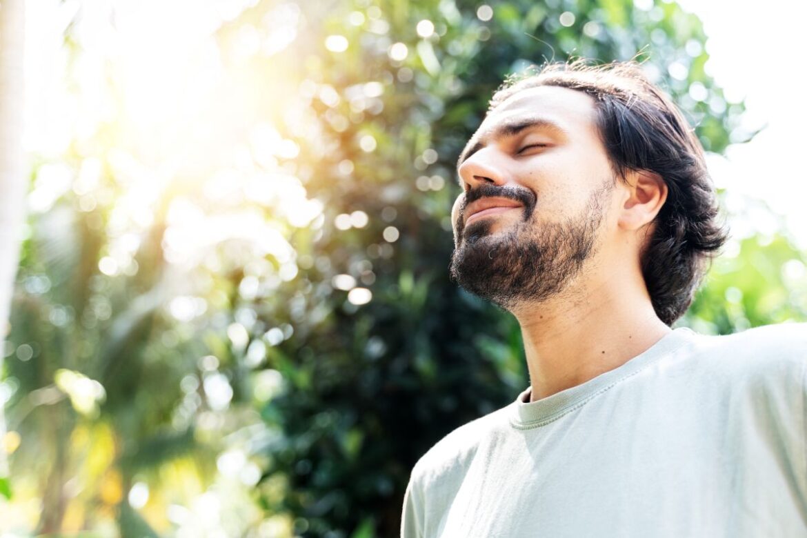 man breathing easy on a sunny day